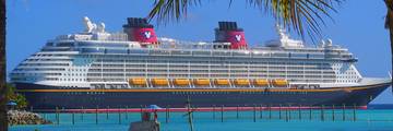 Disney Fantasy cruise ship docked at Castaway Cay in the Bahamas.